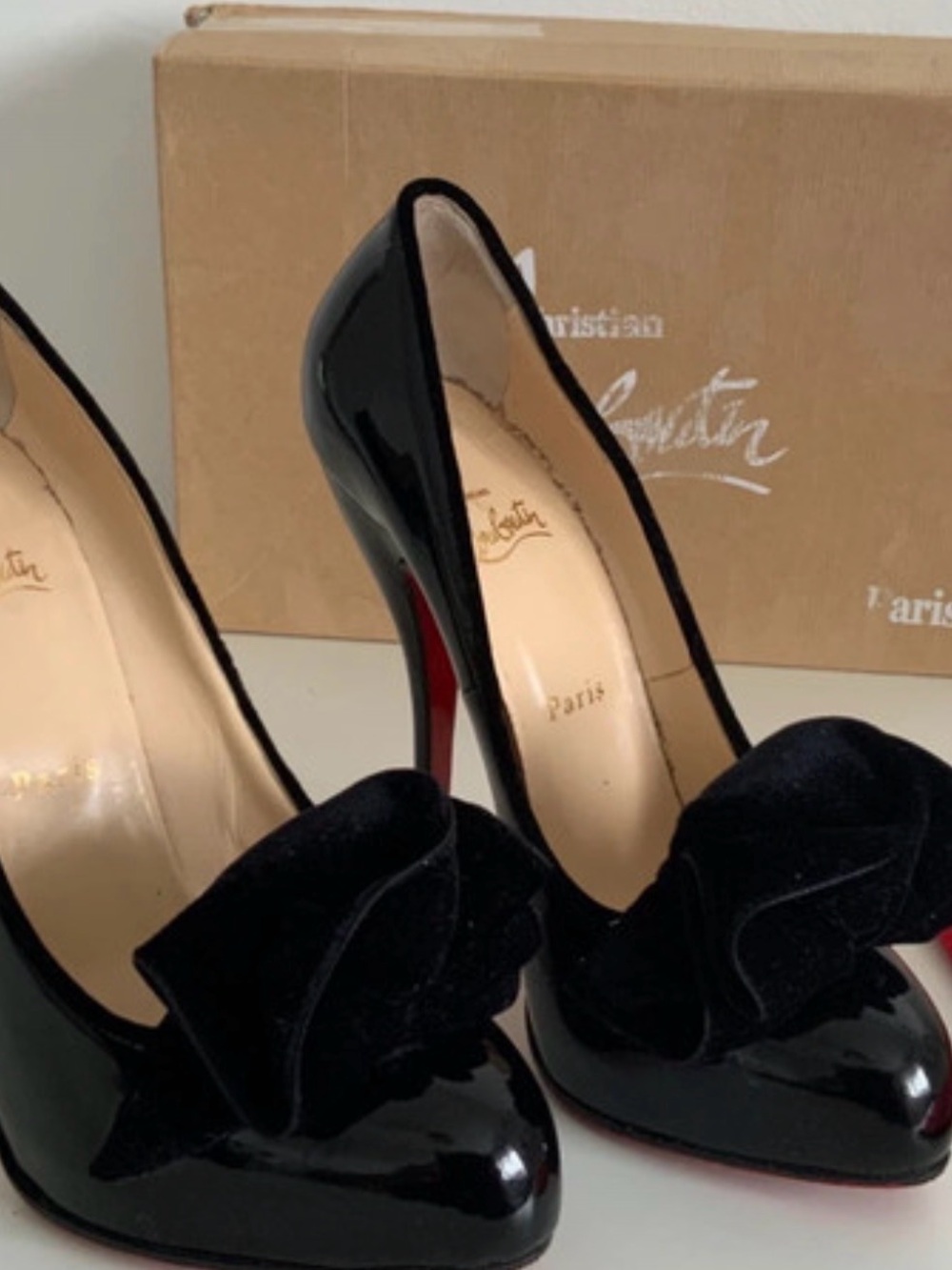 Christian Louboutin Black Patent Leather Bow Pumps with Signature Red Sole
